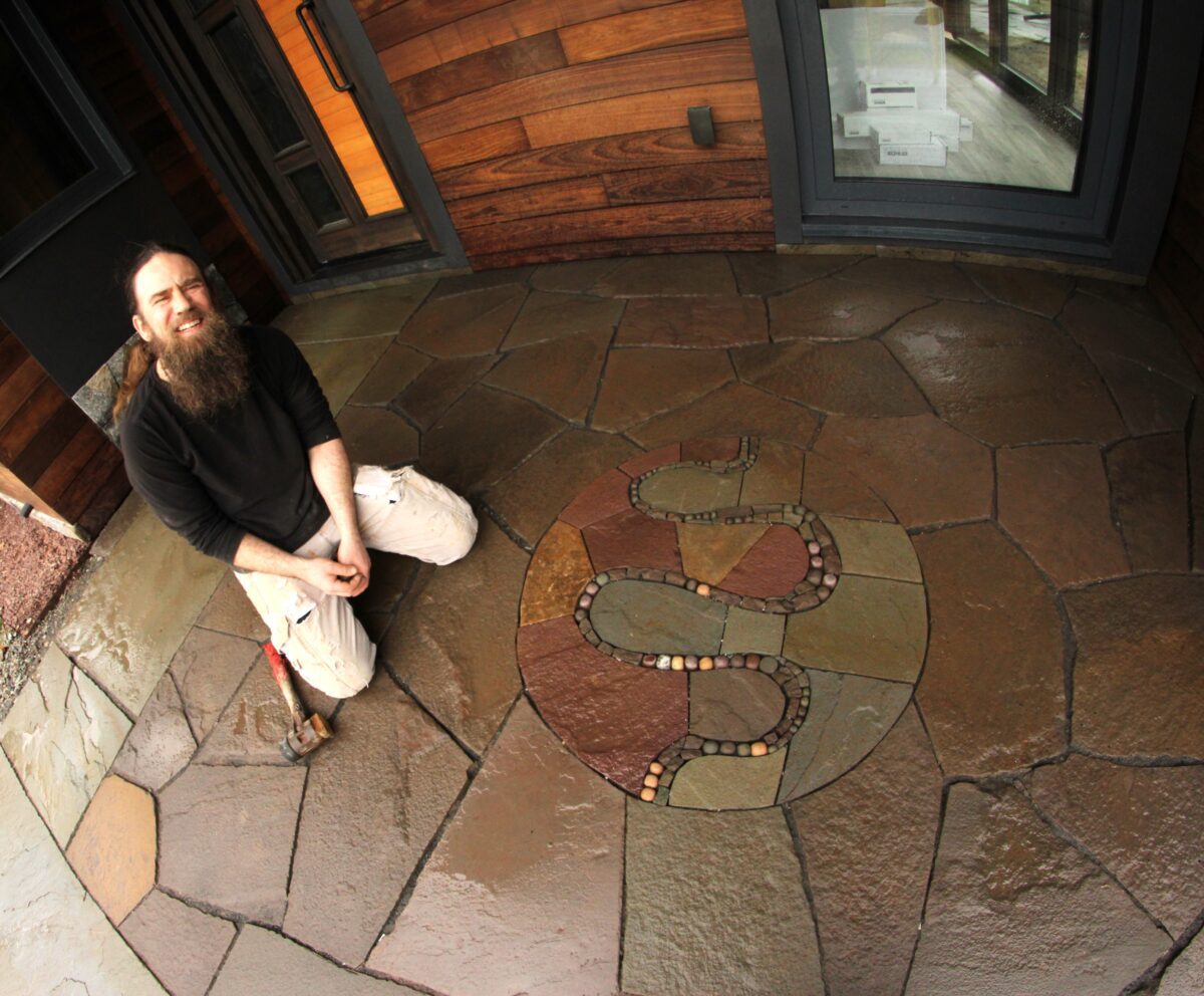 Devin Devine and patio pebble mosaic art